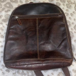 Beautiful leather jack George’s purse backpack great condition